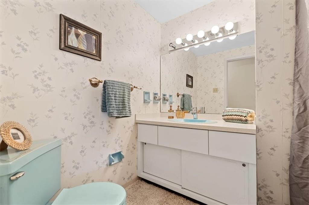 104 Dounreay Place Pittsburgh, PA 15237 - Photo 23 of 43 a bathroom with a sink mirror and toilet