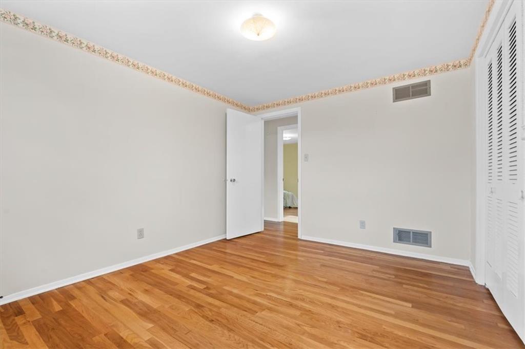 104 Dounreay Place Pittsburgh, PA 15237 - Photo 24 of 43 a view of empty room with wooden floor