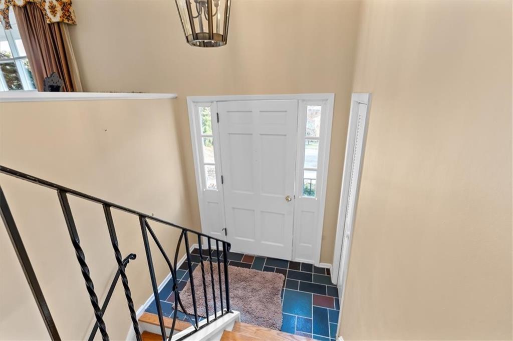 104 Dounreay Place Pittsburgh, PA 15237 - Photo 26 of 43 a view of staircase with railing and white walls