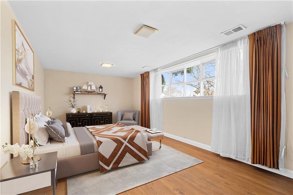 104 Dounreay Place Pittsburgh, PA 15237 - Photo 27 of 43 a living room with furniture wooden floor and a window