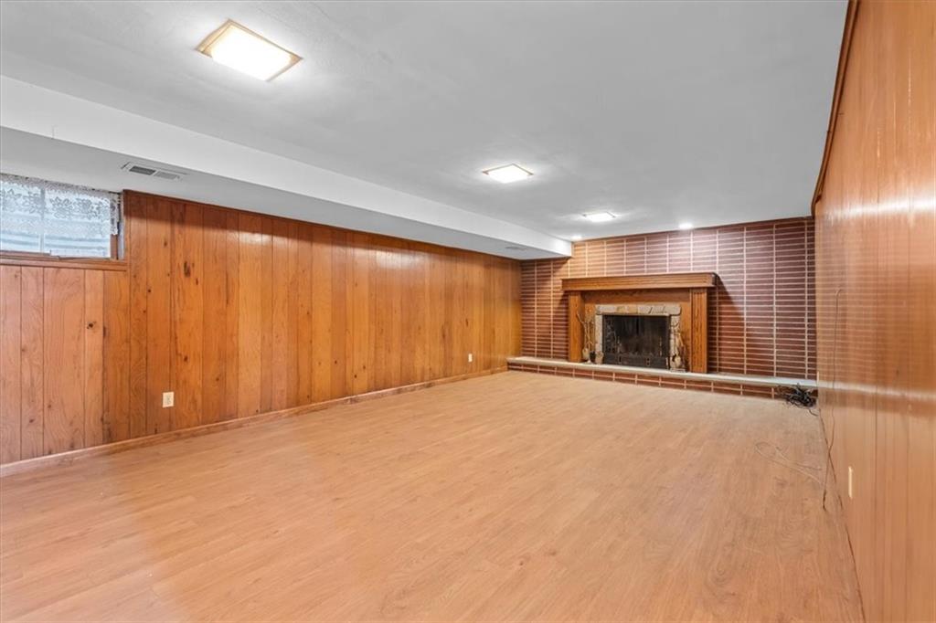 104 Dounreay Place Pittsburgh, PA 15237 - Photo 30 of 43 an empty room with fireplace and a window