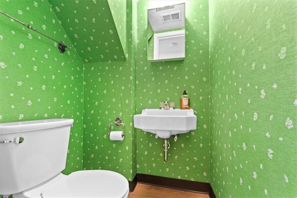 104 Dounreay Place Pittsburgh, PA 15237 - Photo 31 of 43 a bathroom with a toilet sink and mirror