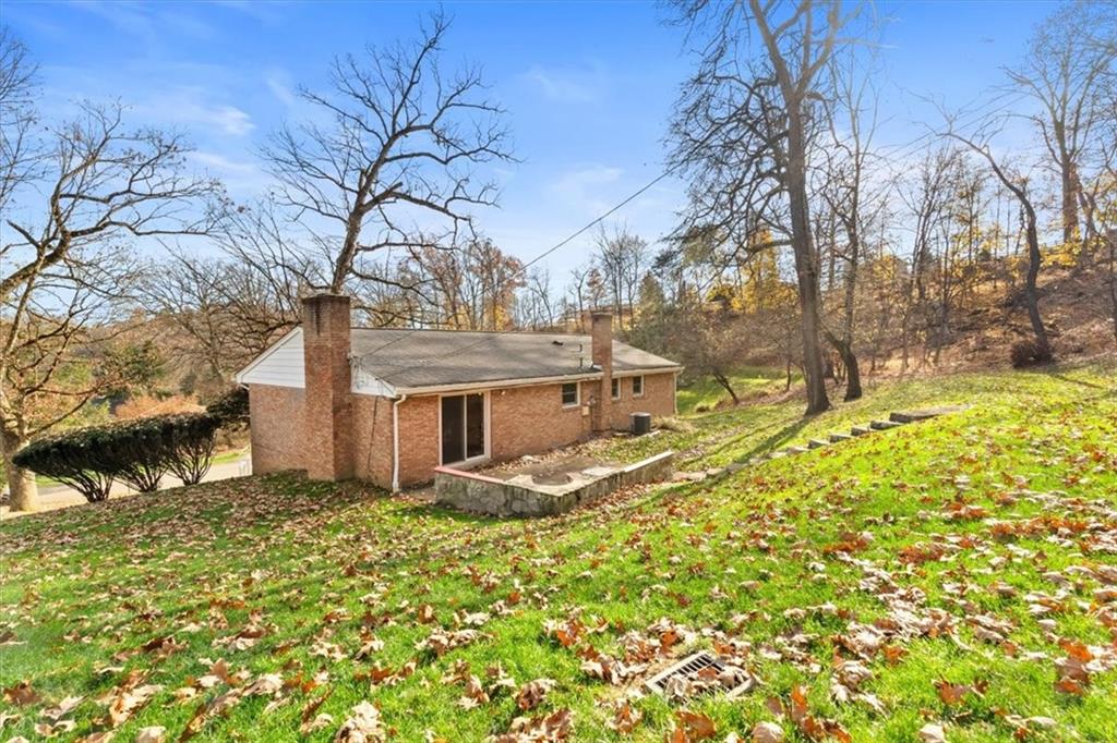 104 Dounreay Place Pittsburgh, PA 15237 - Photo 36 of 43 a view of a house with a large tree and a yard