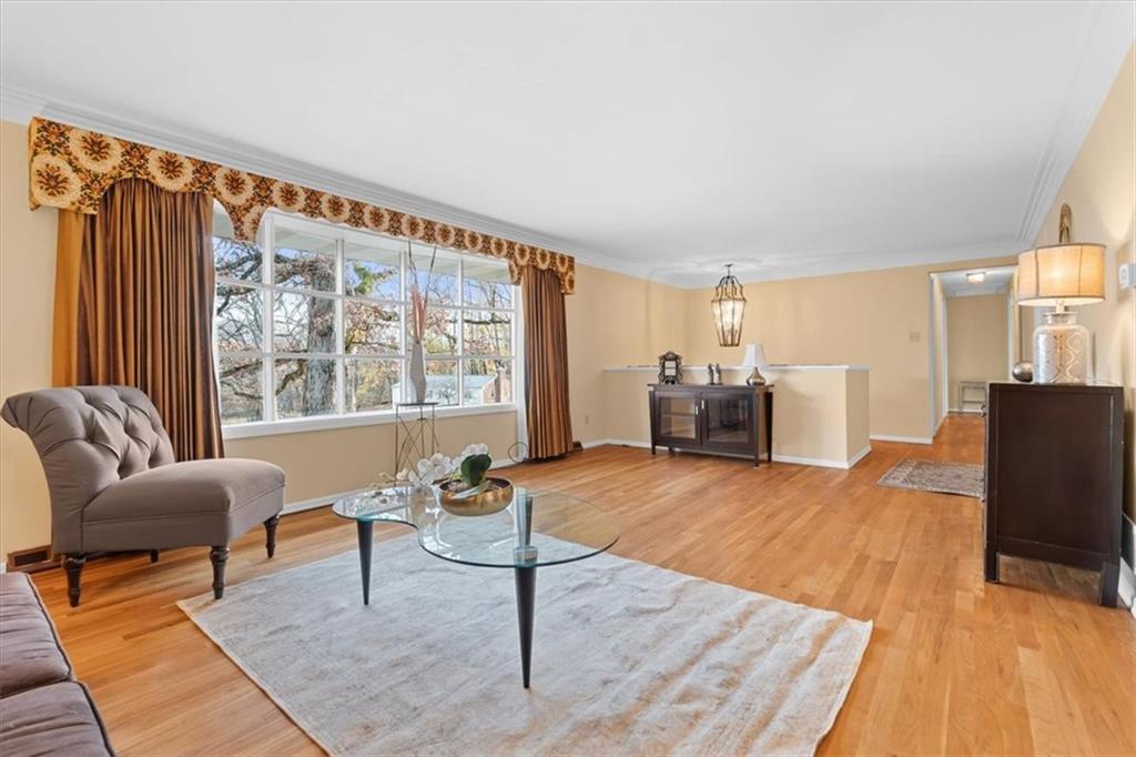 104 Dounreay Place Pittsburgh, PA 15237 - Photo 6 of 43 a living room with furniture and a large window