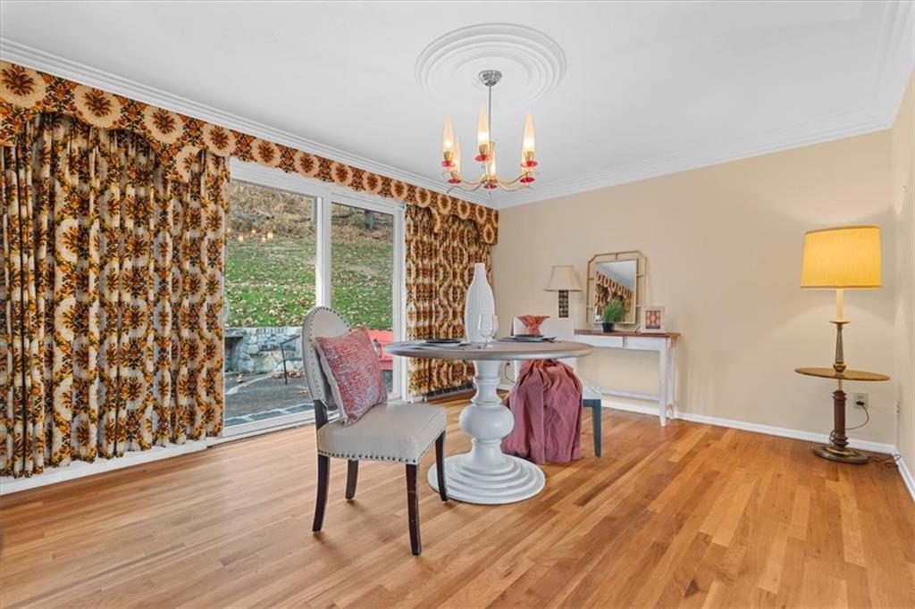 104 Dounreay Place Pittsburgh, PA 15237 - Photo 9 of 43 a view of a dining room with furniture window and wooden floor