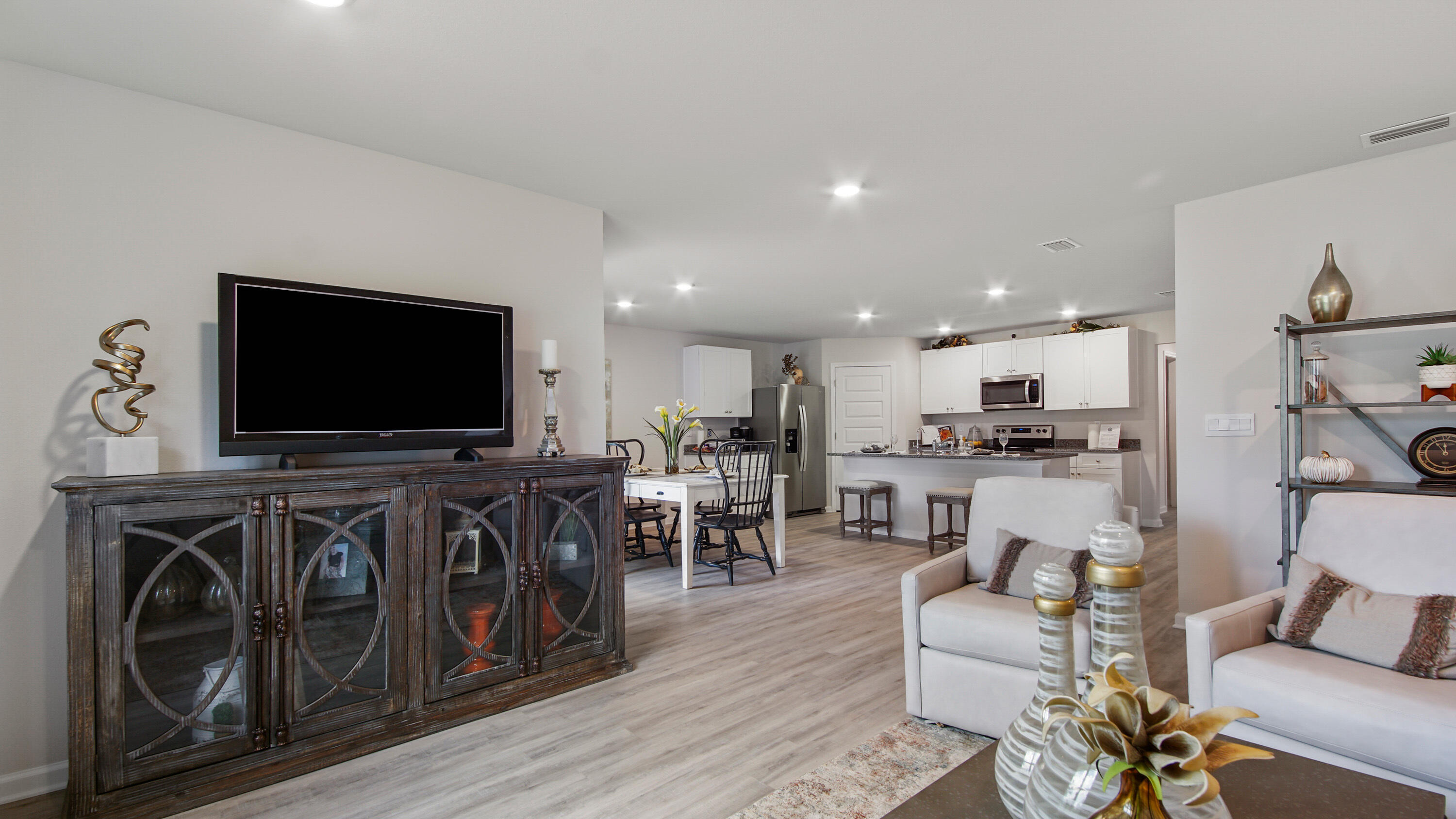 211 Gray Owl Drive Freeport, FL 32439 - Photo 11 of 35 a living room with furniture and a flat screen tv