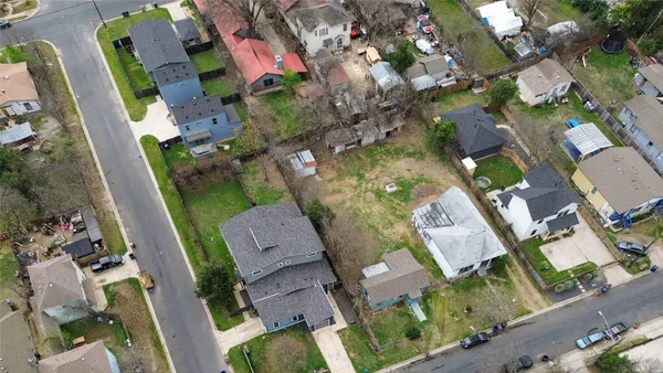 an aerial view of a house with a garden