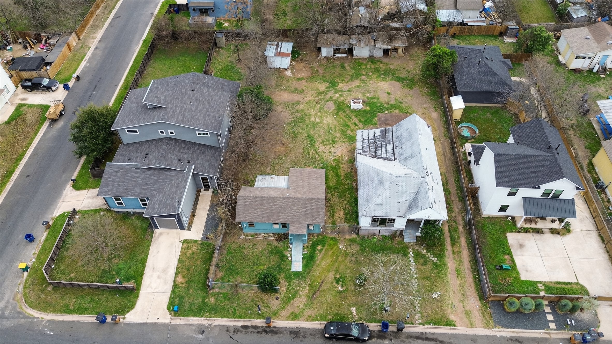 6917 Carver Avenue Austin, TX 78752 - Photo 14 of 16 an aerial view of residential houses with outdoor space and parking