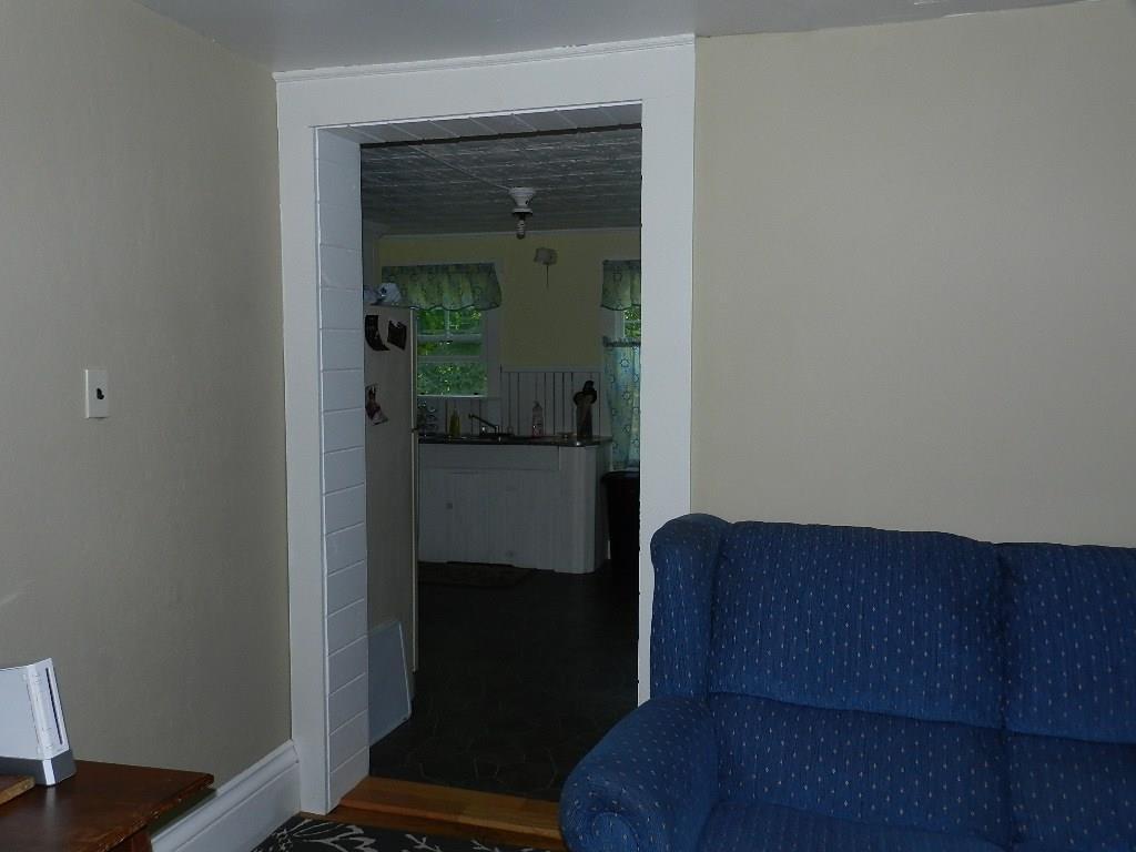 7 Hillman Ferry Road Livermore Falls, ME 04254 - Photo 8 of 32 LR looking toward kitchen