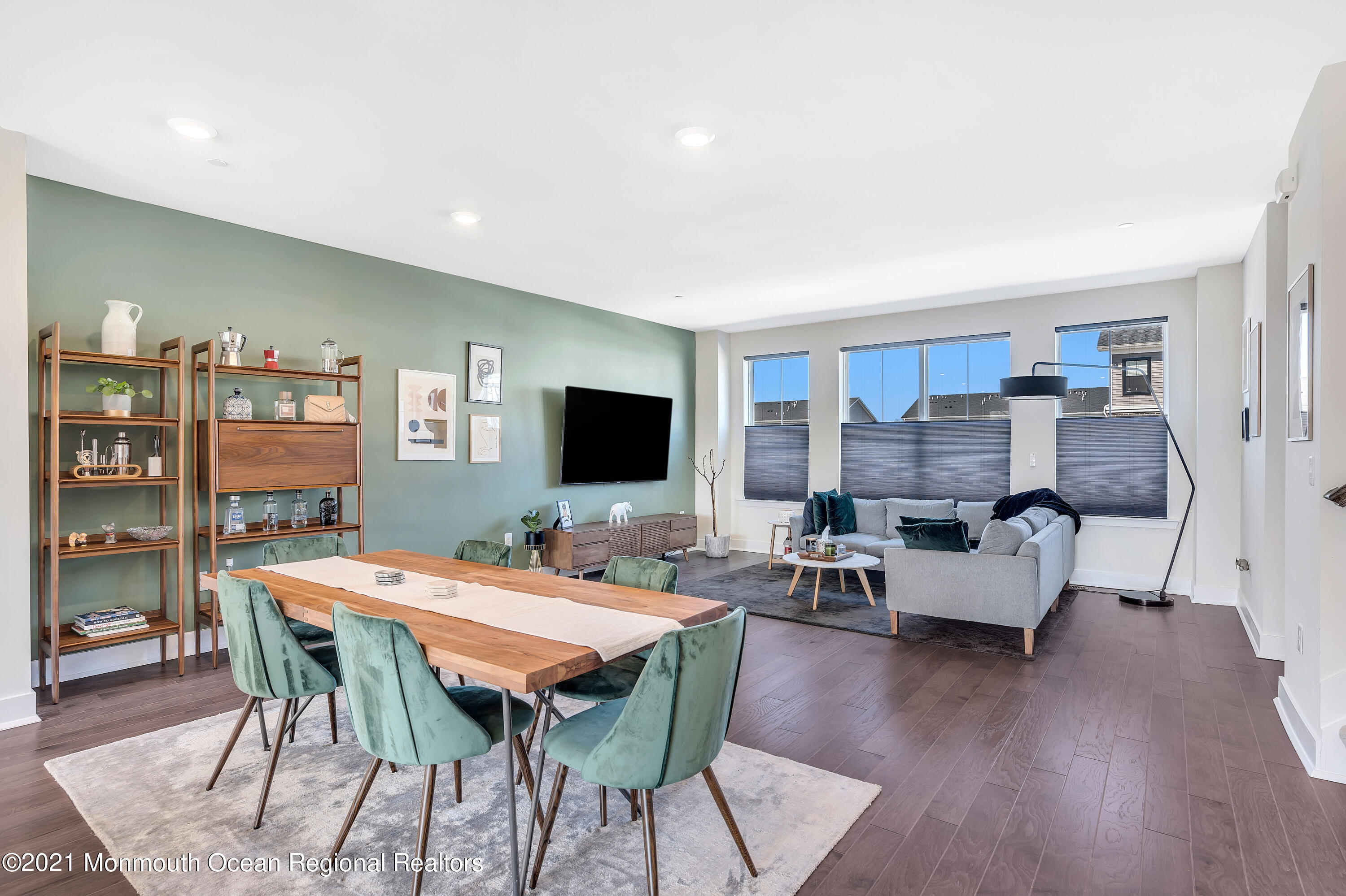 26 Kelly Way Tinton Falls, NJ 07724 - Photo 15 of 34 a living room with furniture a flat screen tv and a table