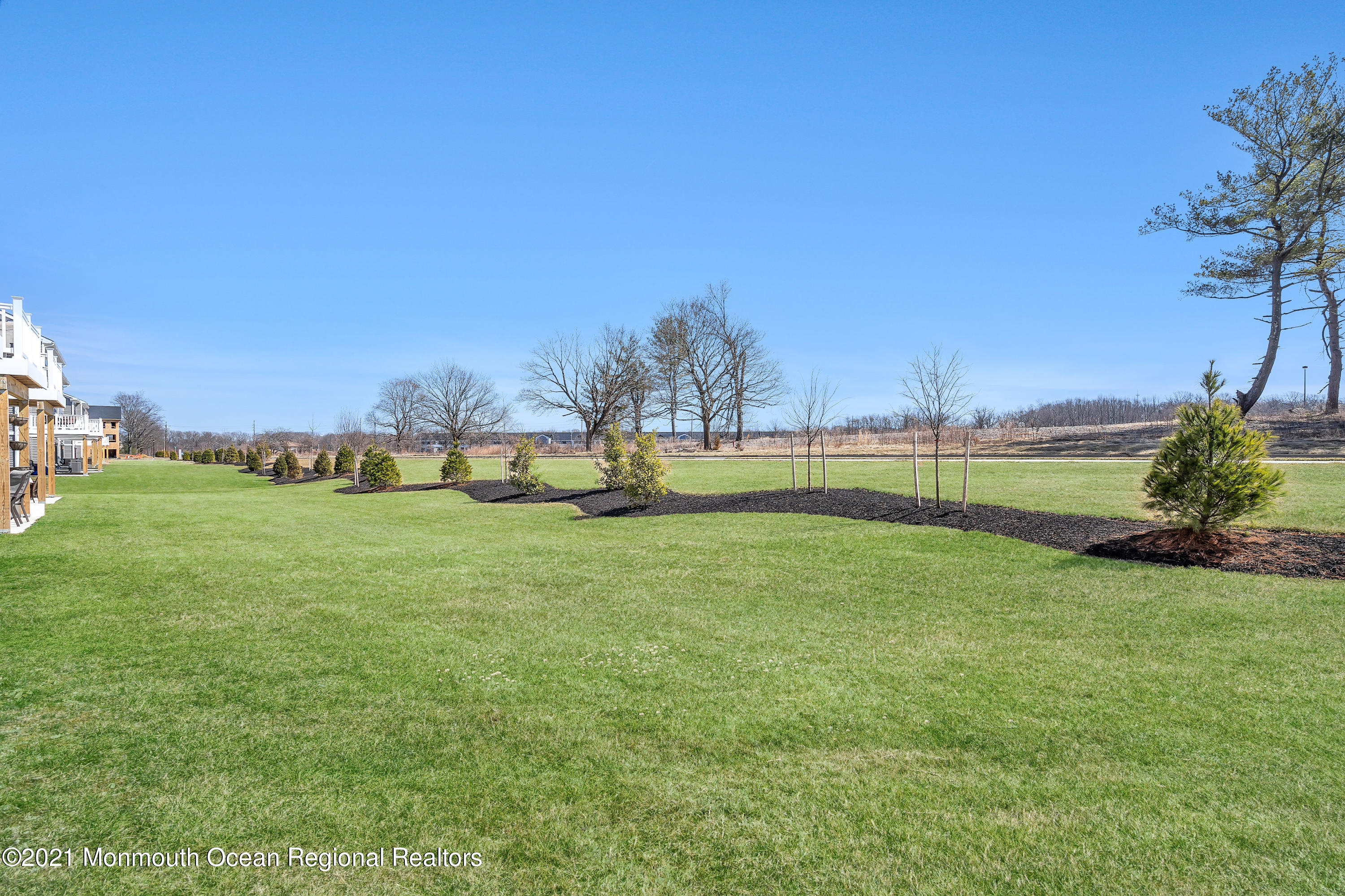 26 Kelly Way Tinton Falls, NJ 07724 - Photo 34 of 34 a view of a field with grass and trees