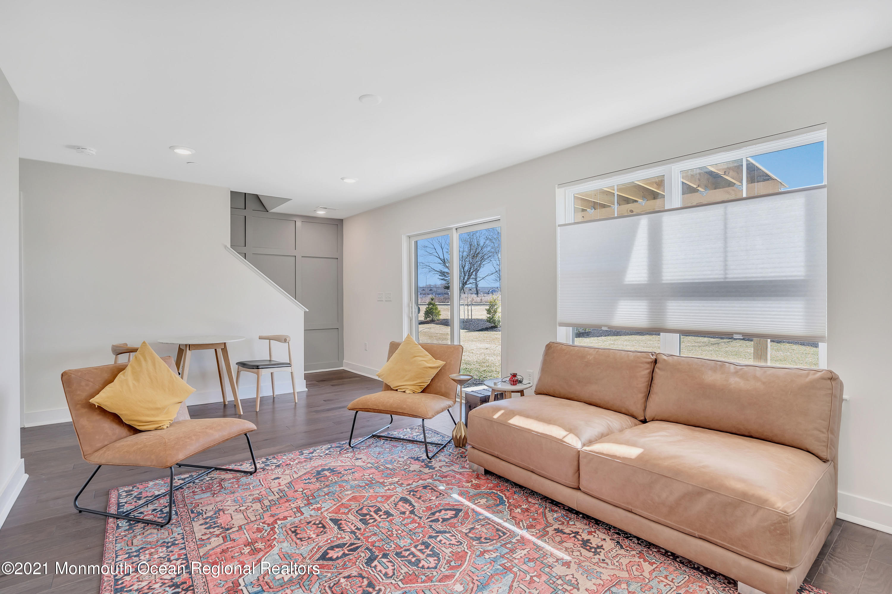 26 Kelly Way Tinton Falls, NJ 07724 - Photo 6 of 34 a living room with furniture and a large window