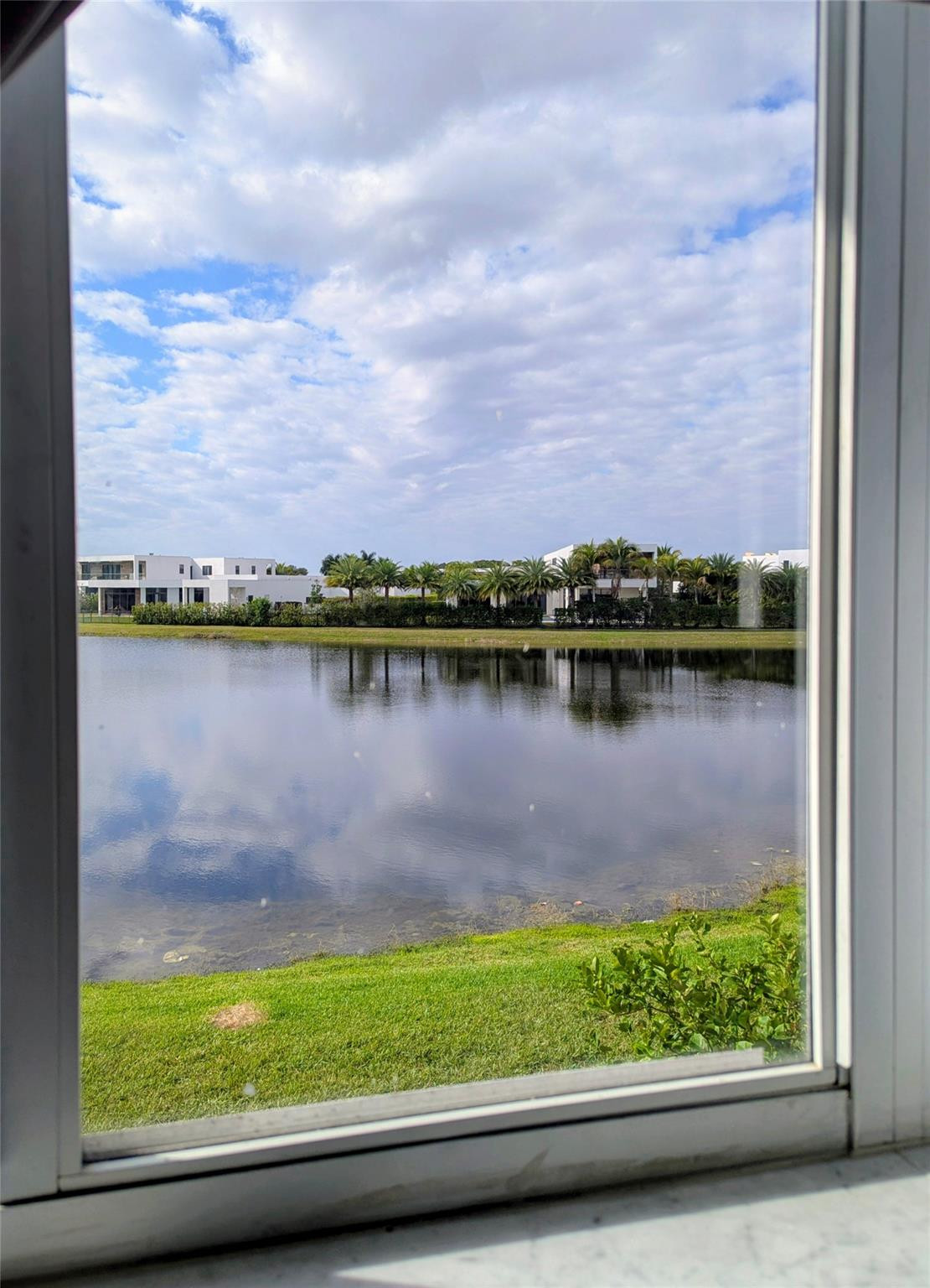 158 Riviera Circle, Unit 193 Weston, FL 33326 - Photo 18 of 22 Lake view from master bedroom