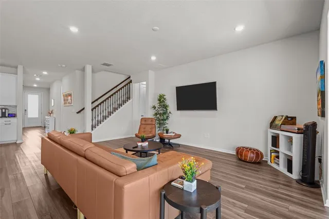 a bedroom with a bed and a table