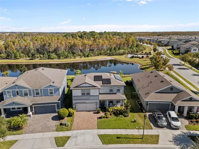 an aerial view of a house with a garden