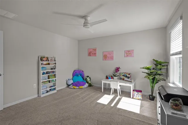 an aerial view of a house with swimming pool