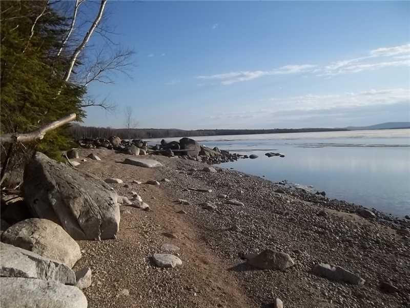 Lot 8-22 Stephens Road Oquossoc, ME 04964 - Photo 3 of 4 Exterior Front. low waterfrontage in...