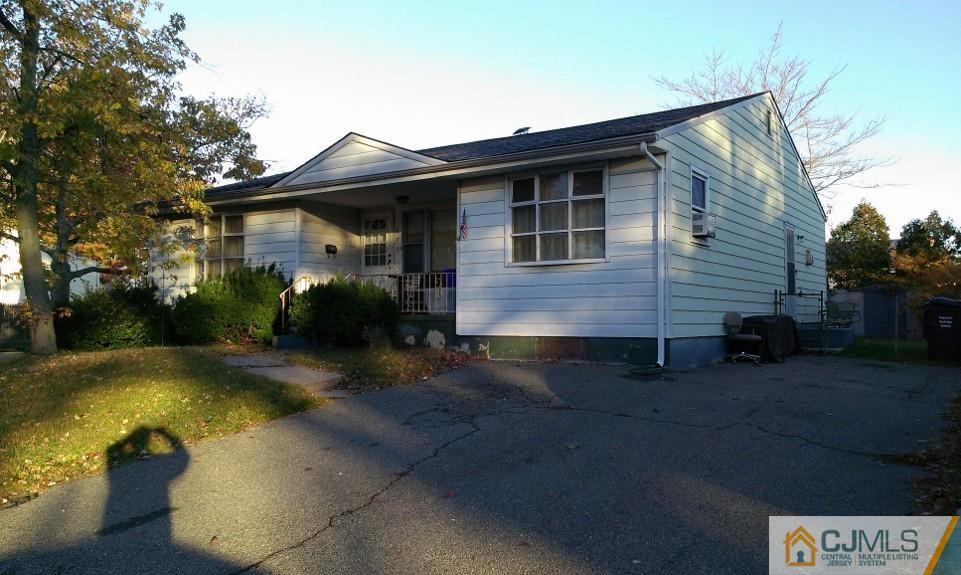 572 New Dover Road Colonia, NJ 07067 - Photo 1 of 10 a front view of a house with garden