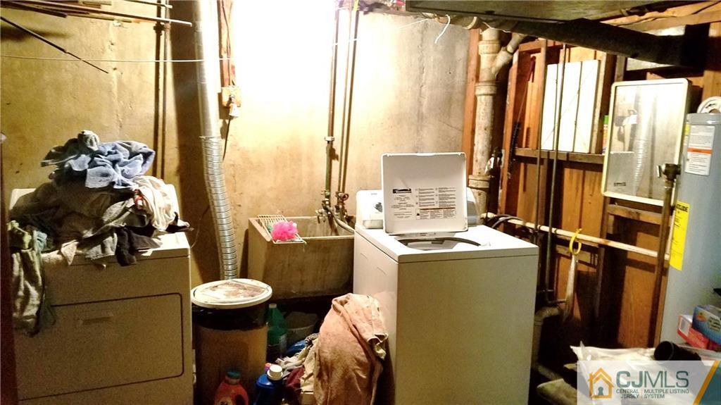 572 New Dover Road Colonia, NJ 07067 - Photo 9 of 10 a room with water heater and windows