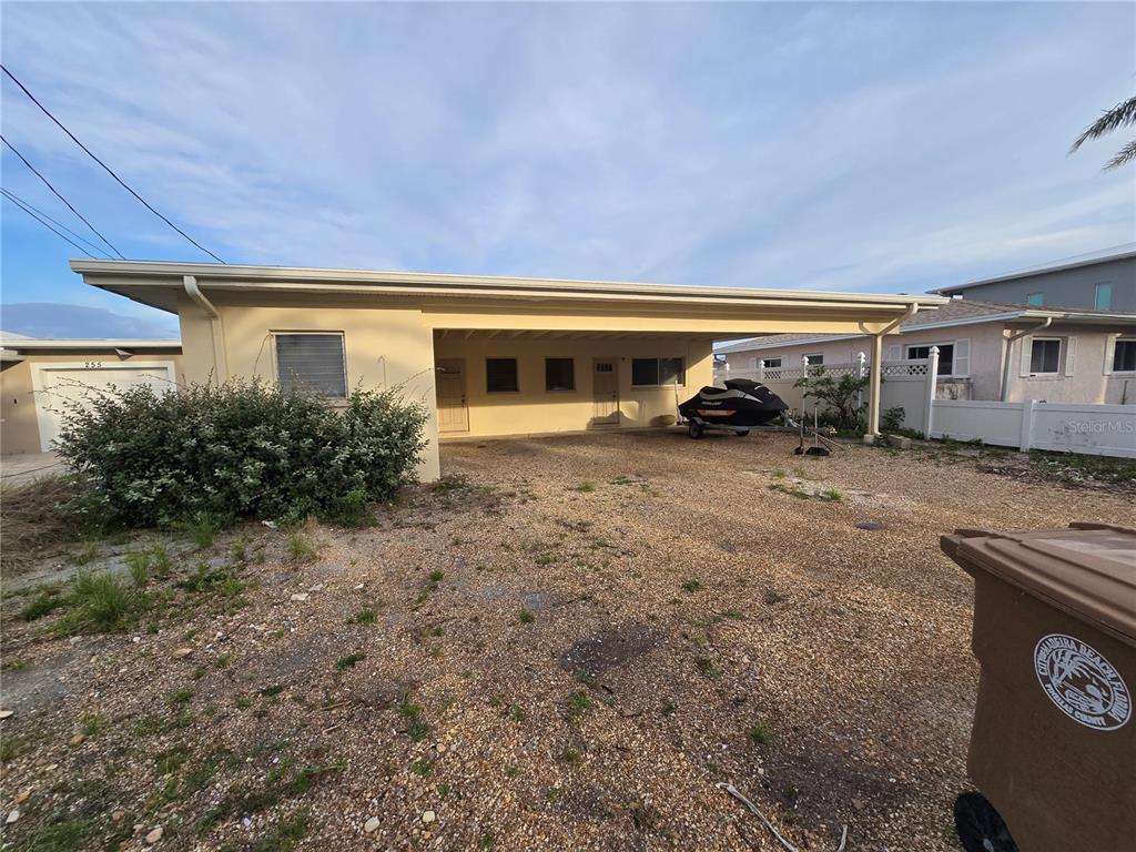 249 144th Avenue Madeira Beach, FL 33708 - Photo 5 of 5 a view of a house with backyard and sitting area