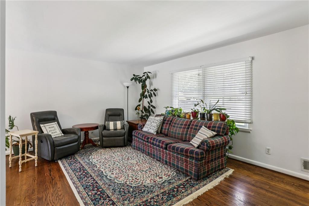2740 Frontier Trail Atlanta, GA 30341 - Photo 12 of 29 a living room with furniture and a rug
