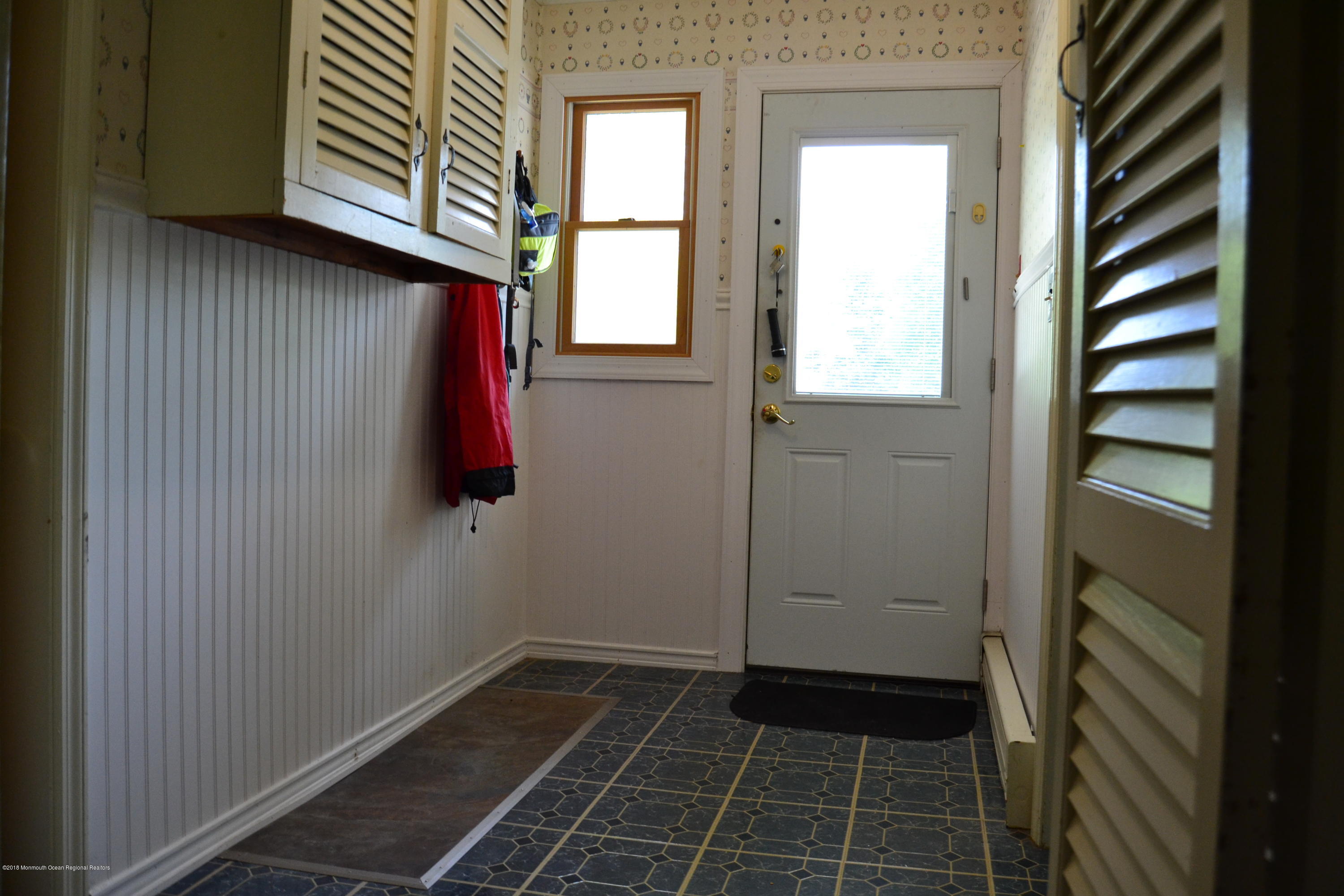 591 Craig Road Manalapan, NJ 07726 - Photo 4 of 17 a bathroom with a sink and a shower