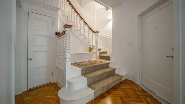 a view of entryway with wooden floor