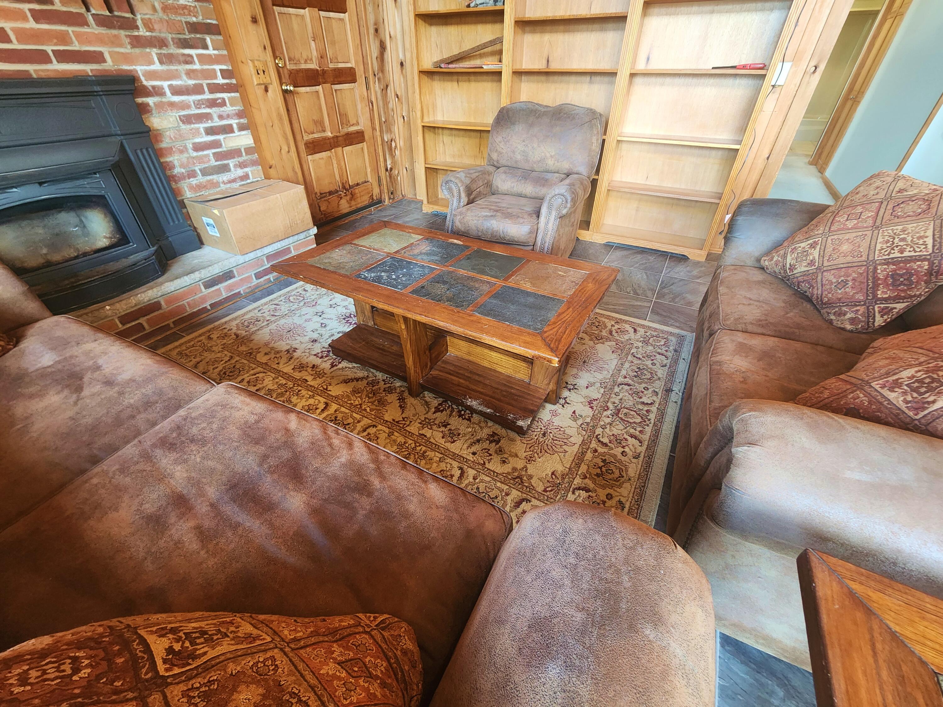 2263 Cramer Road Bushkill, PA 18324 - Photo 22 of 70 a living room with furniture and a fireplace