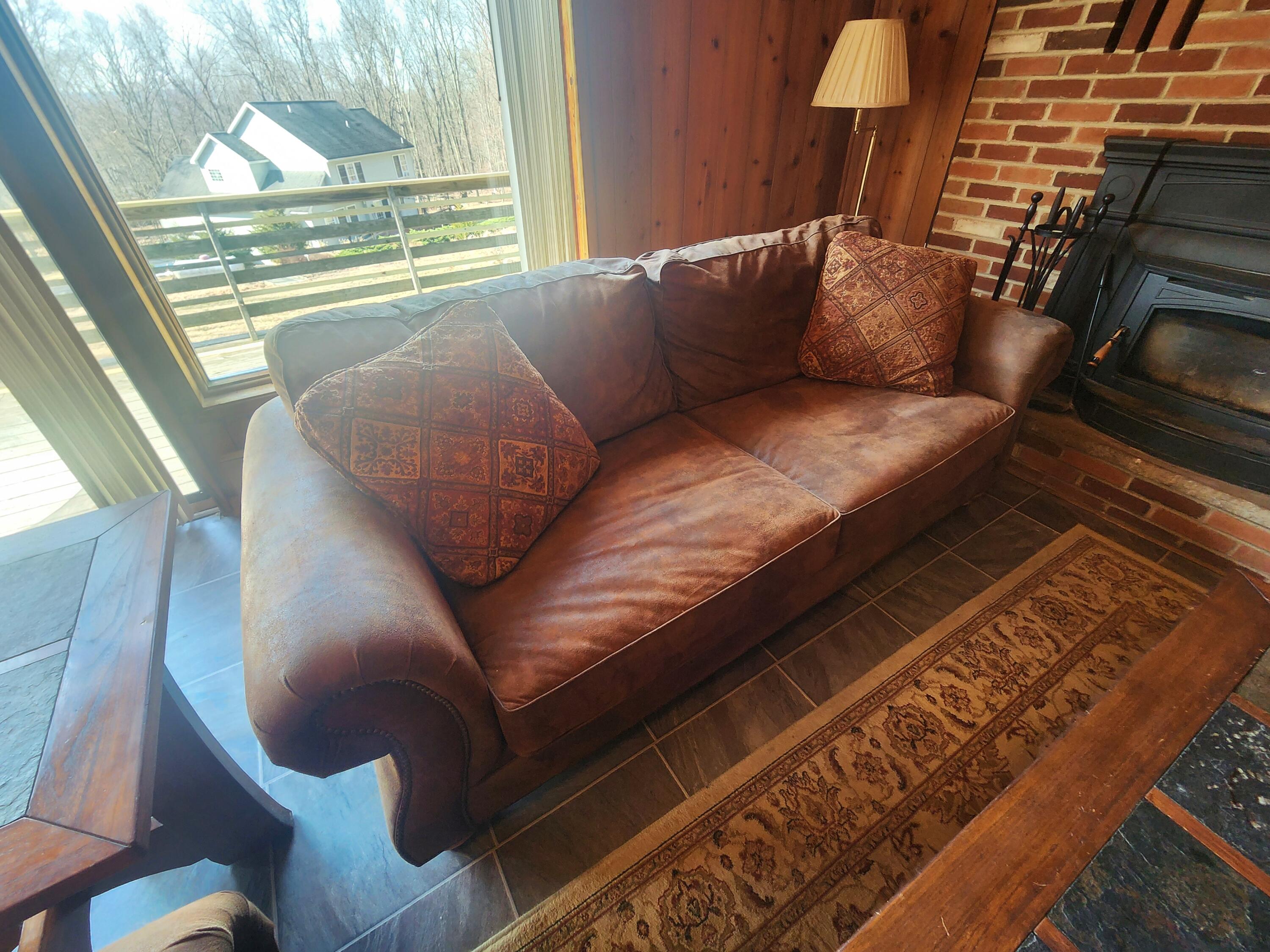 2263 Cramer Road Bushkill, PA 18324 - Photo 23 of 70 a large living room with a couch