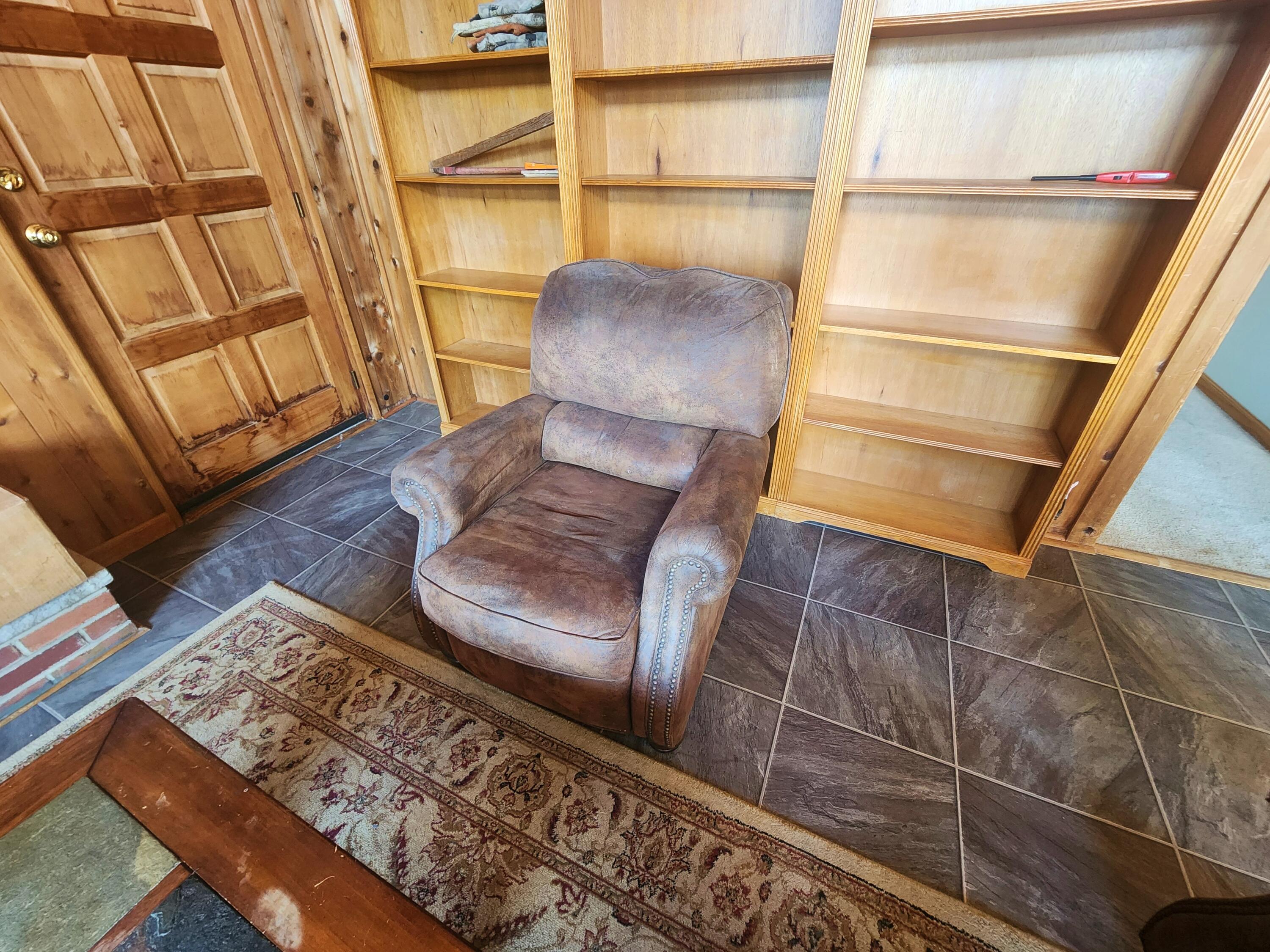 2263 Cramer Road Bushkill, PA 18324 - Photo 24 of 70 a view of staircase with wooden floor and chair