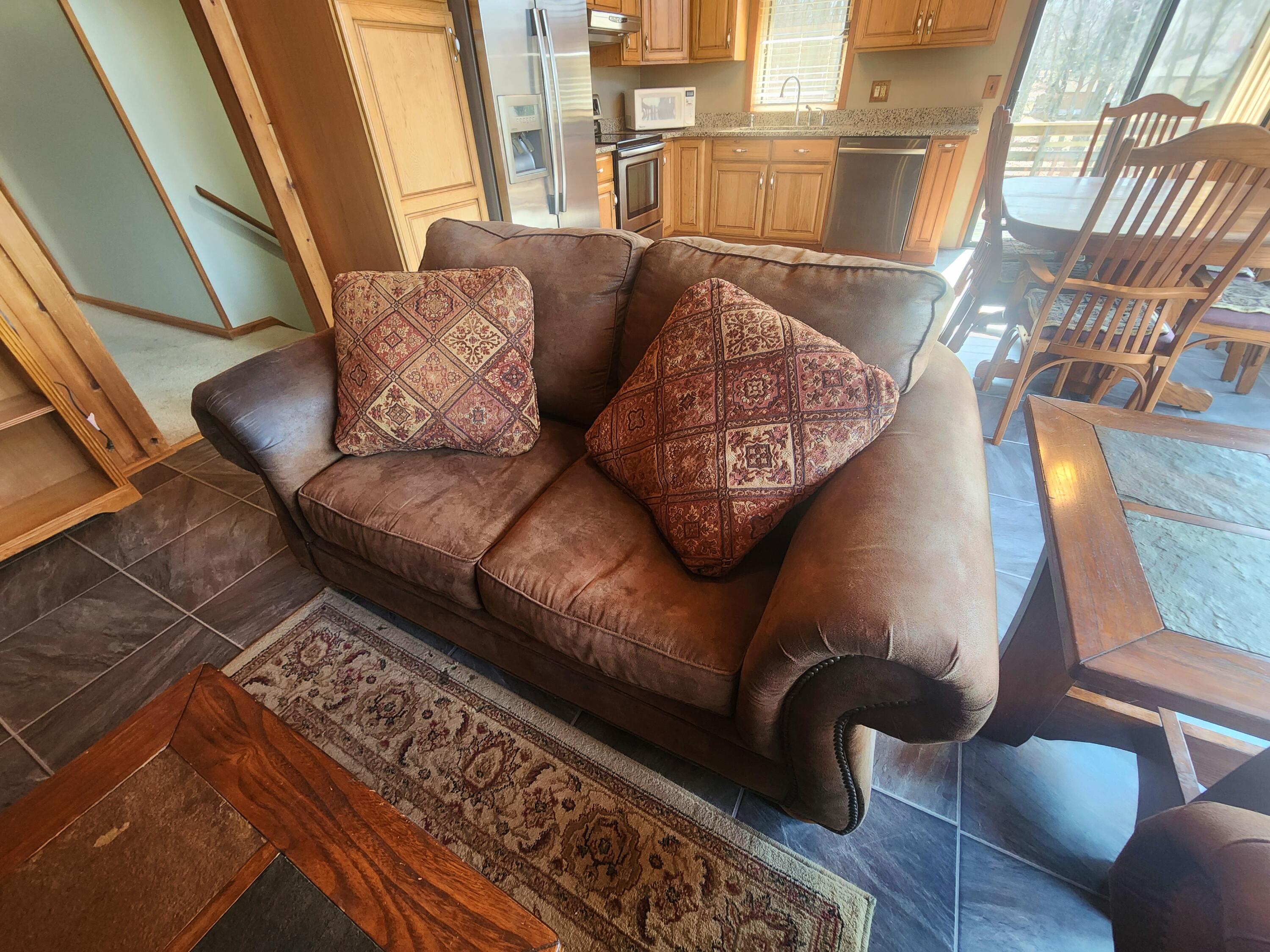 2263 Cramer Road Bushkill, PA 18324 - Photo 25 of 70 a living room with furniture and a rug