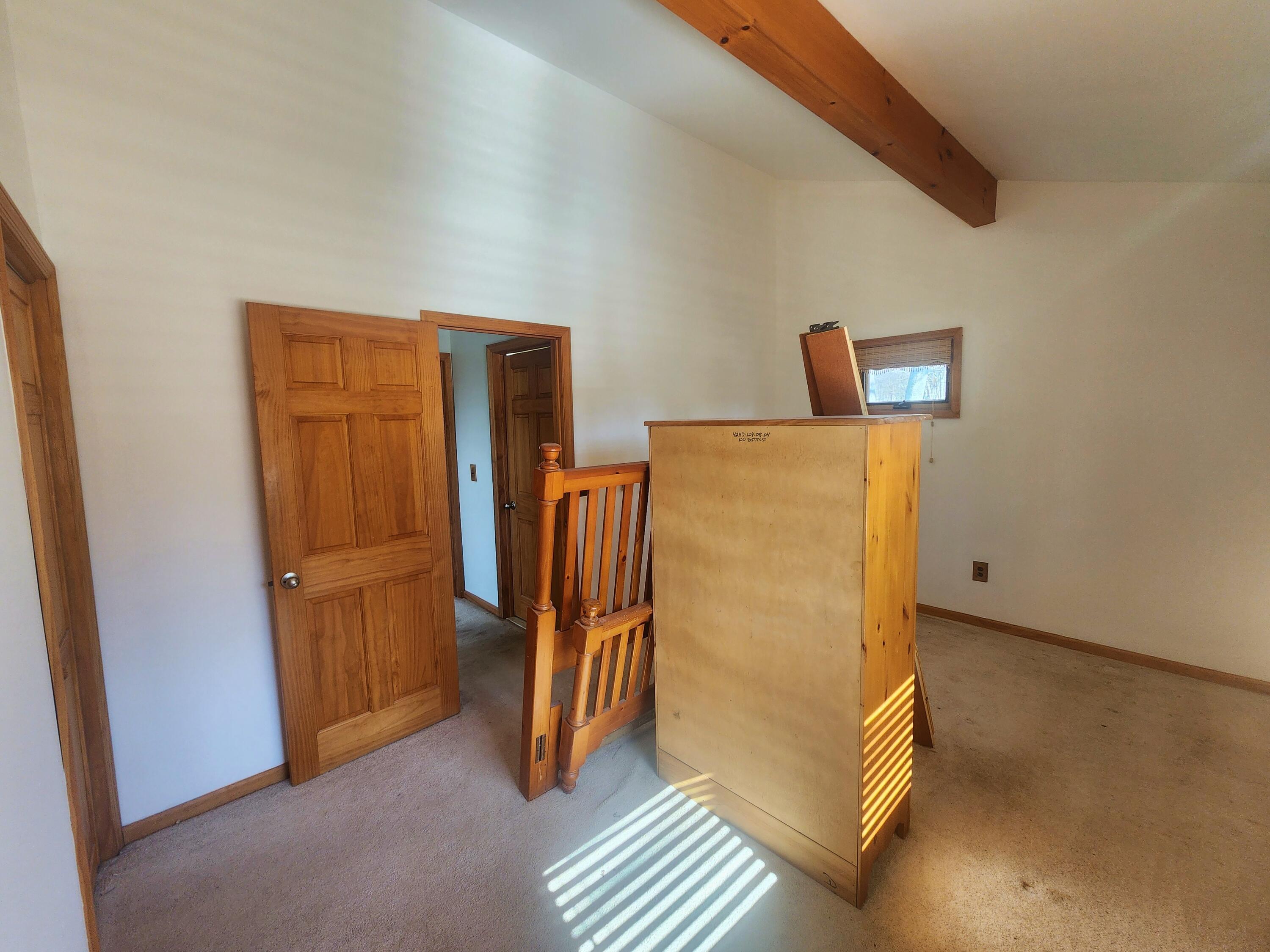 2263 Cramer Road Bushkill, PA 18324 - Photo 27 of 70 a view of a storage & utility room with refrigerator and a stove