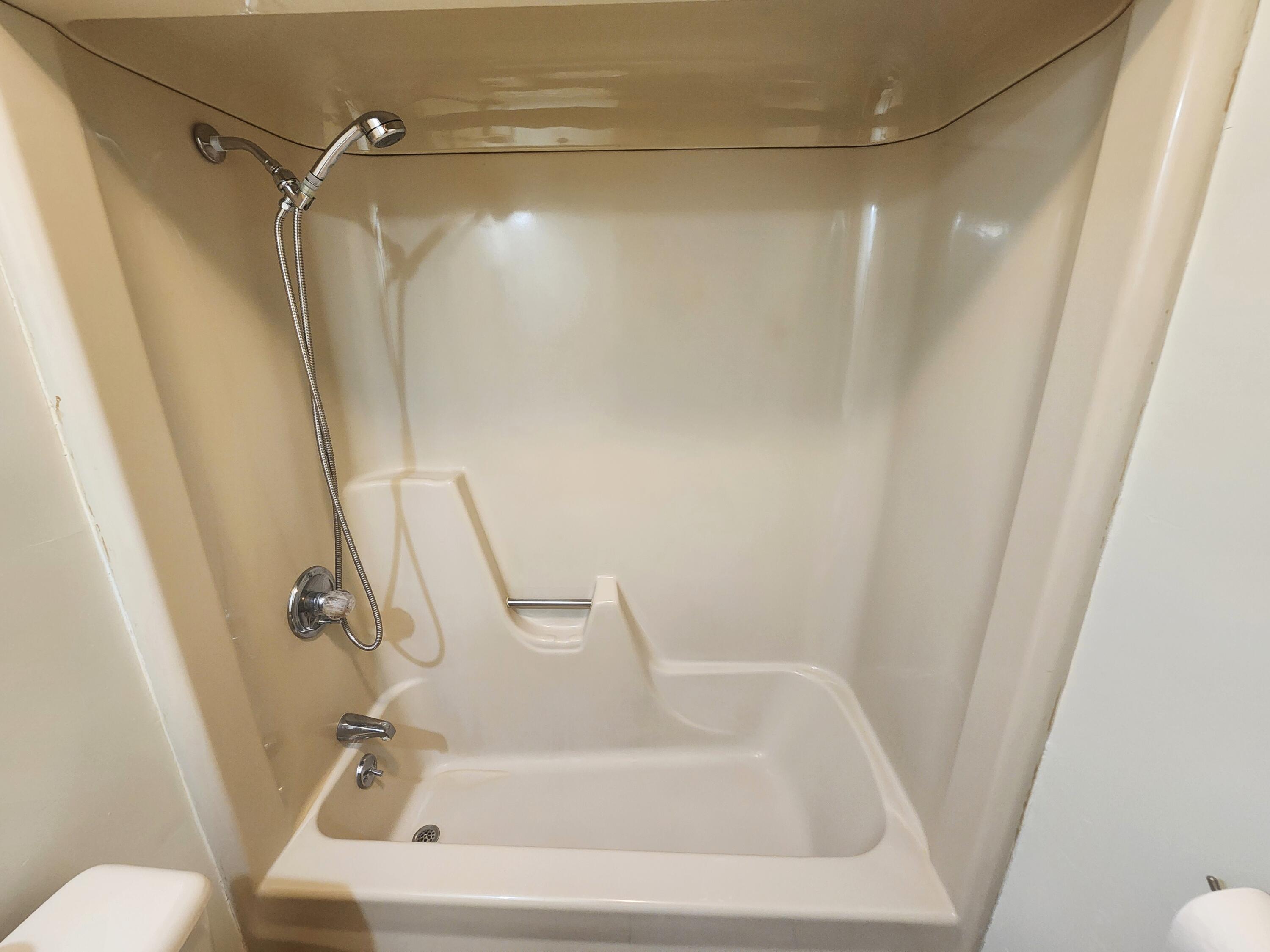 2263 Cramer Road Bushkill, PA 18324 - Photo 45 of 70 a bath tub sitting next to a white sink and toilet