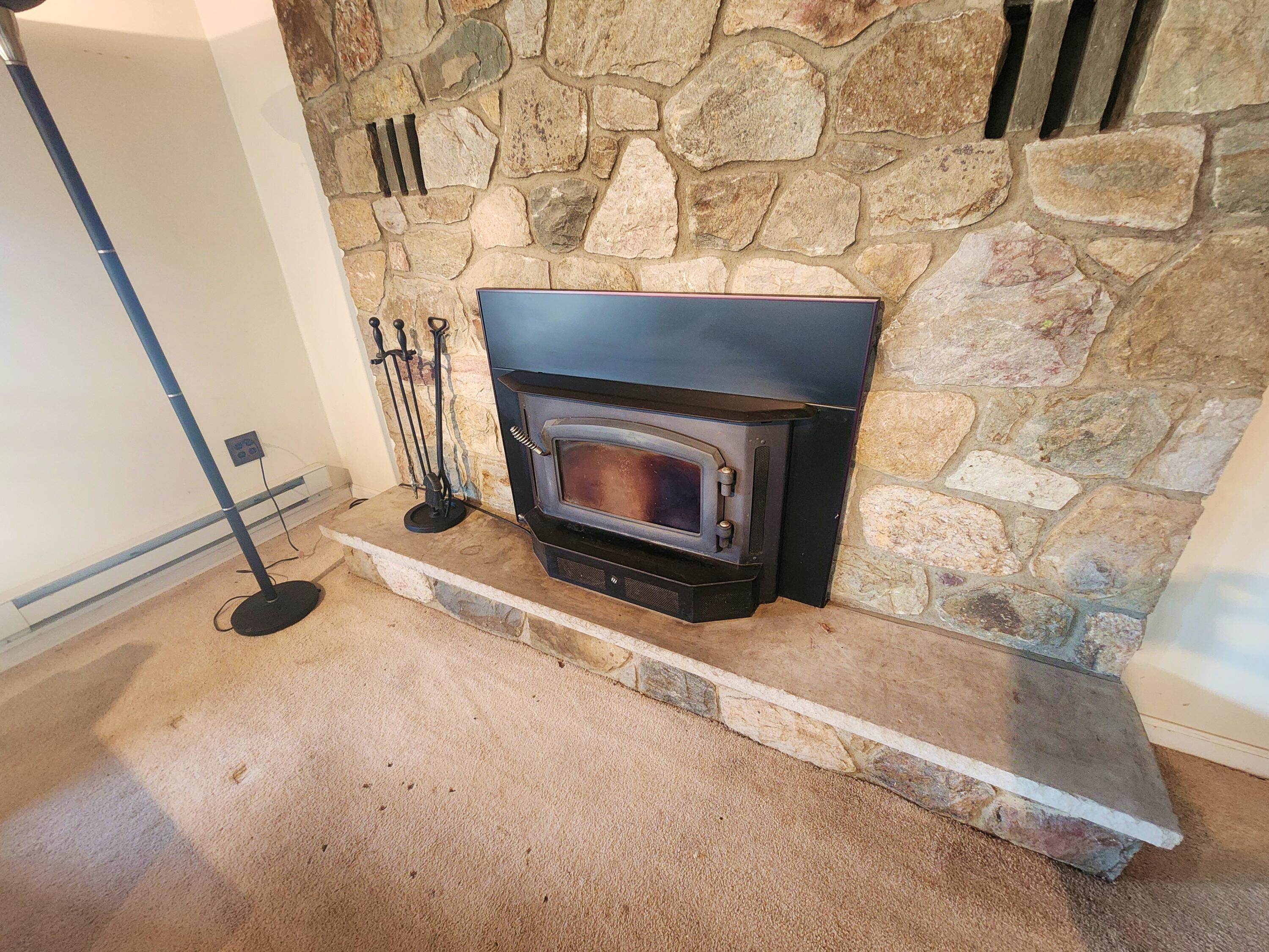 2263 Cramer Road Bushkill, PA 18324 - Photo 51 of 70 a living room with a fireplace