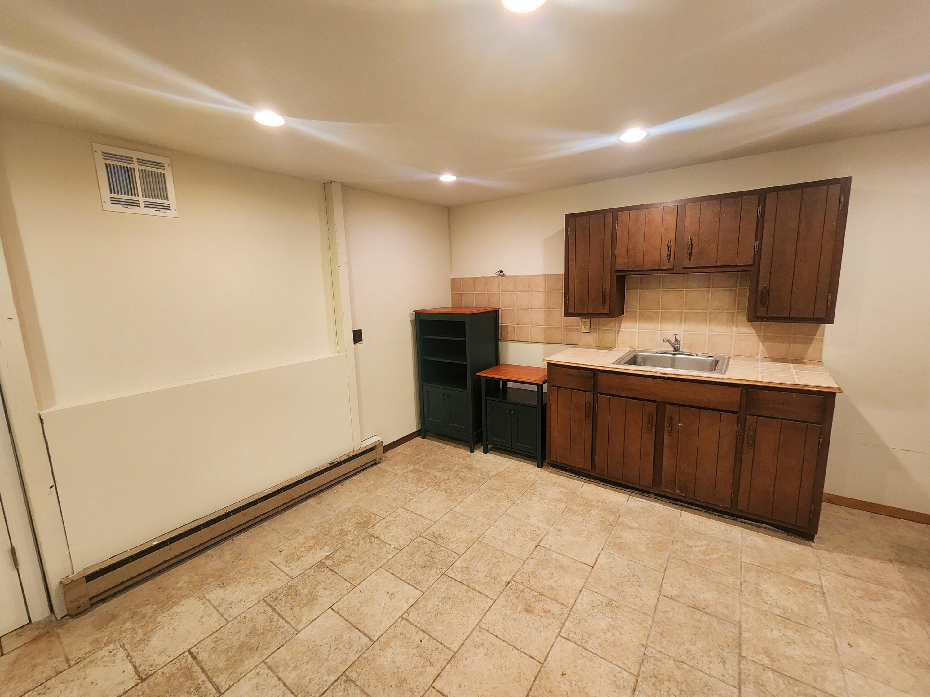 2263 Cramer Road Bushkill, PA 18324 - Photo 54 of 70 a kitchen with stainless steel appliances a refrigerator and a sink