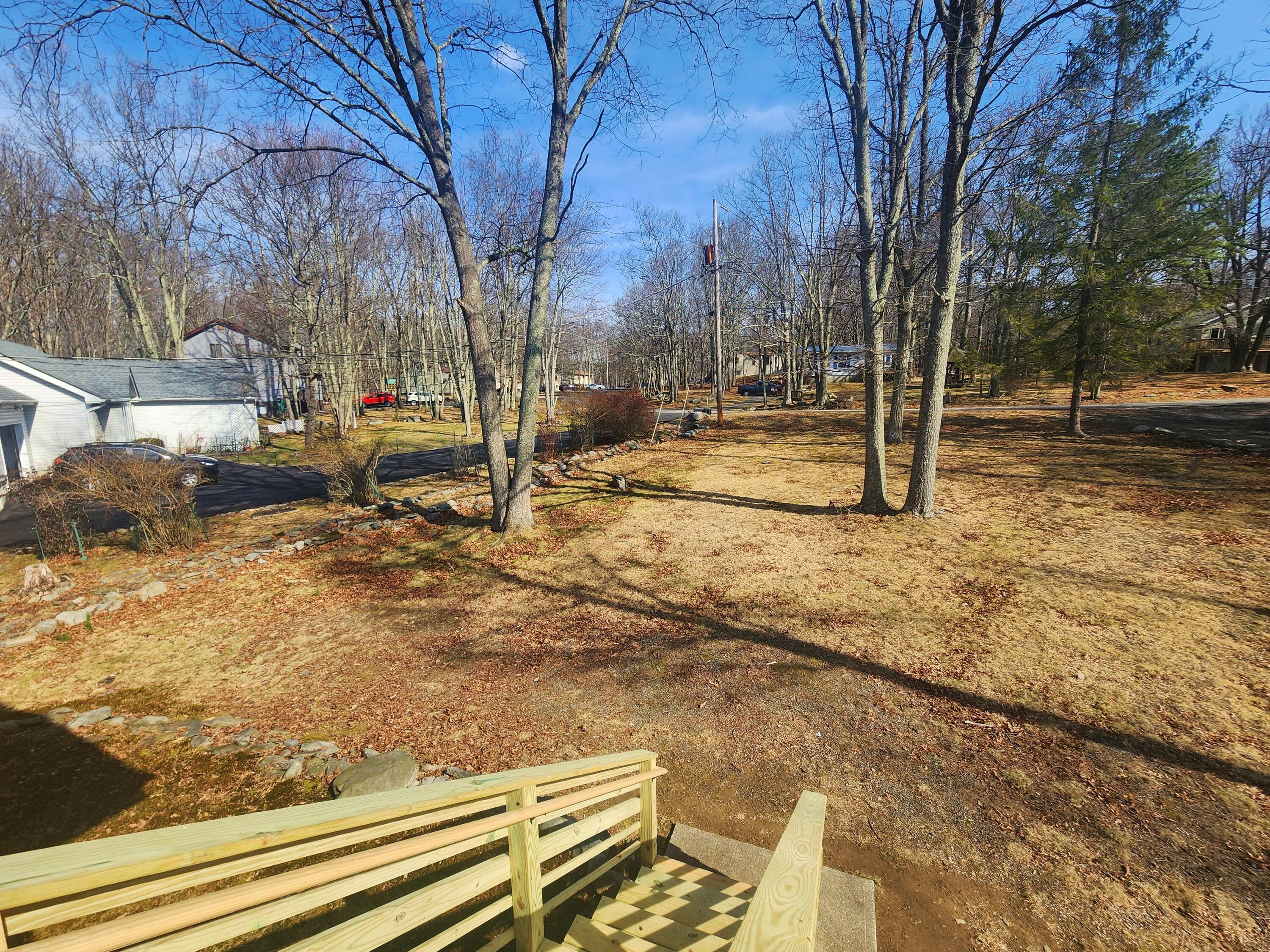 2263 Cramer Road Bushkill, PA 18324 - Photo 65 of 70 a view of a yard with snow on the road