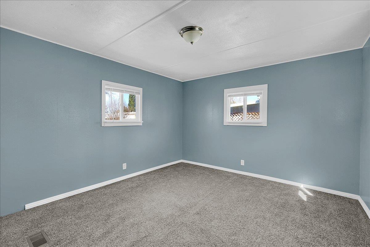 1523 North Beale Road, Unit 47 Marysville, CA 95901 - Photo 16 of 17 a view of an empty room with a window