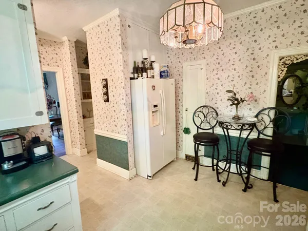 a view of a livingroom with furniture and furniture