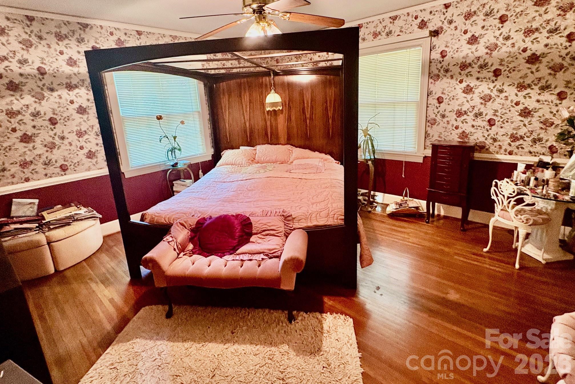 1612 South New Hope Road Gastonia, NC 28054 - Photo 22 of 38 a balcony with furniture and wooden floor