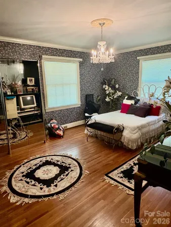 a room with furniture and a chandelier