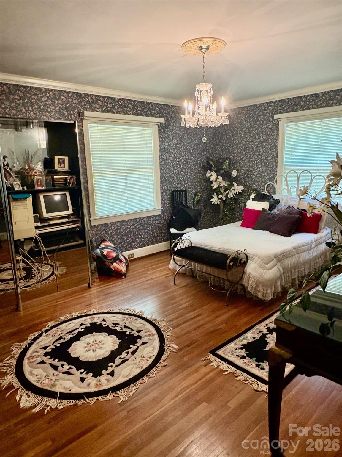 1612 South New Hope Road Gastonia, NC 28054 - Photo 25 of 38 a room with furniture and a chandelier