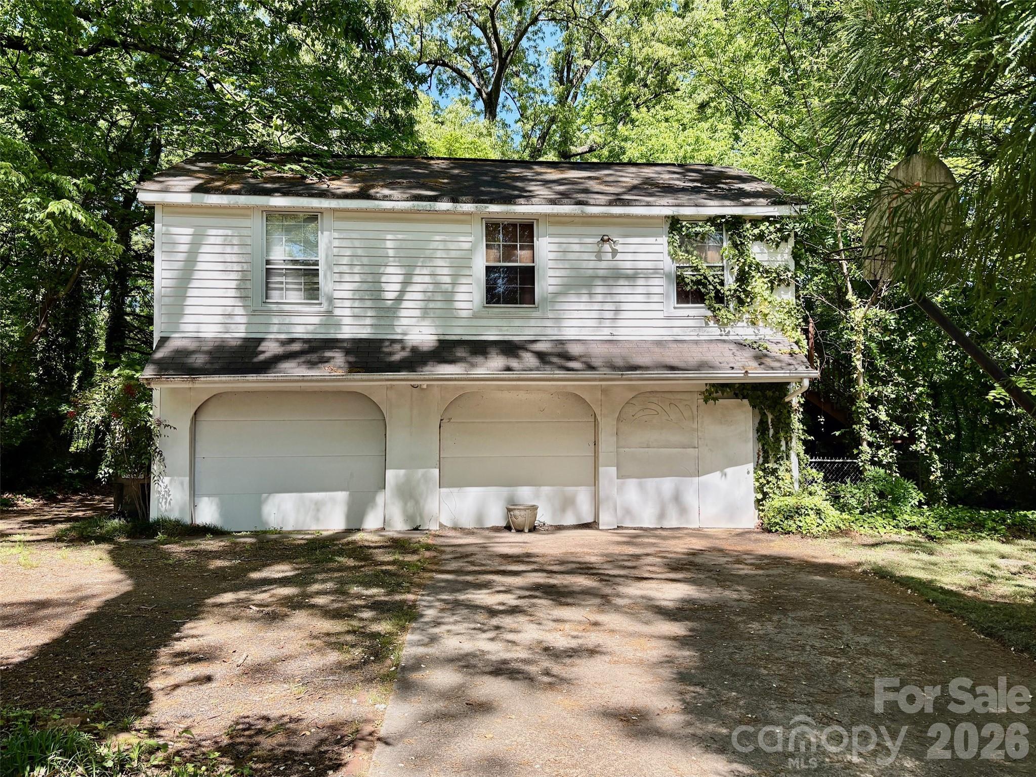 1612 South New Hope Road Gastonia, NC 28054 - Photo 28 of 38 a front view of a house with a yard