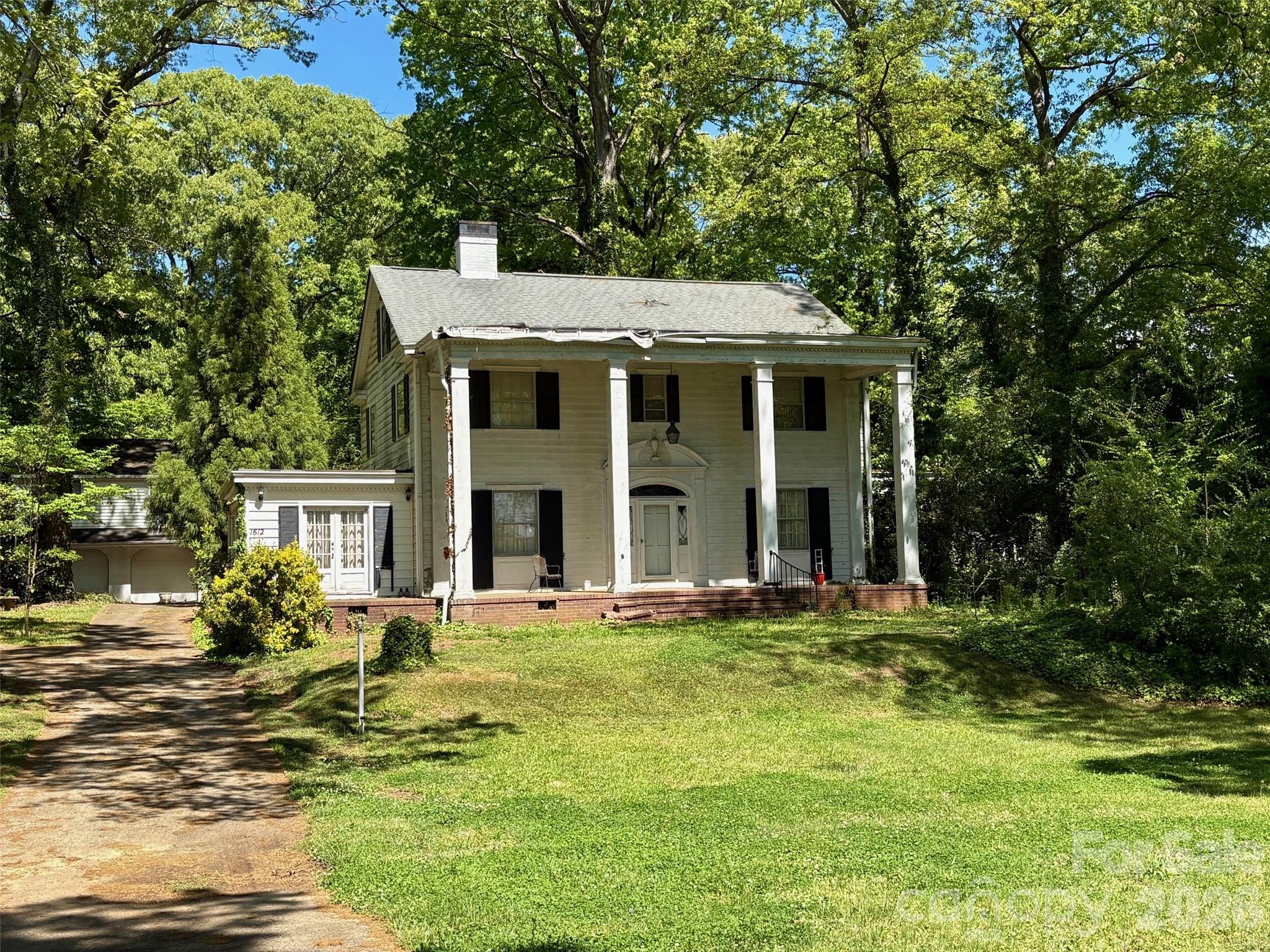 1612 South New Hope Road Gastonia, NC 28054 - Photo 3 of 38 a view of a house with backyard