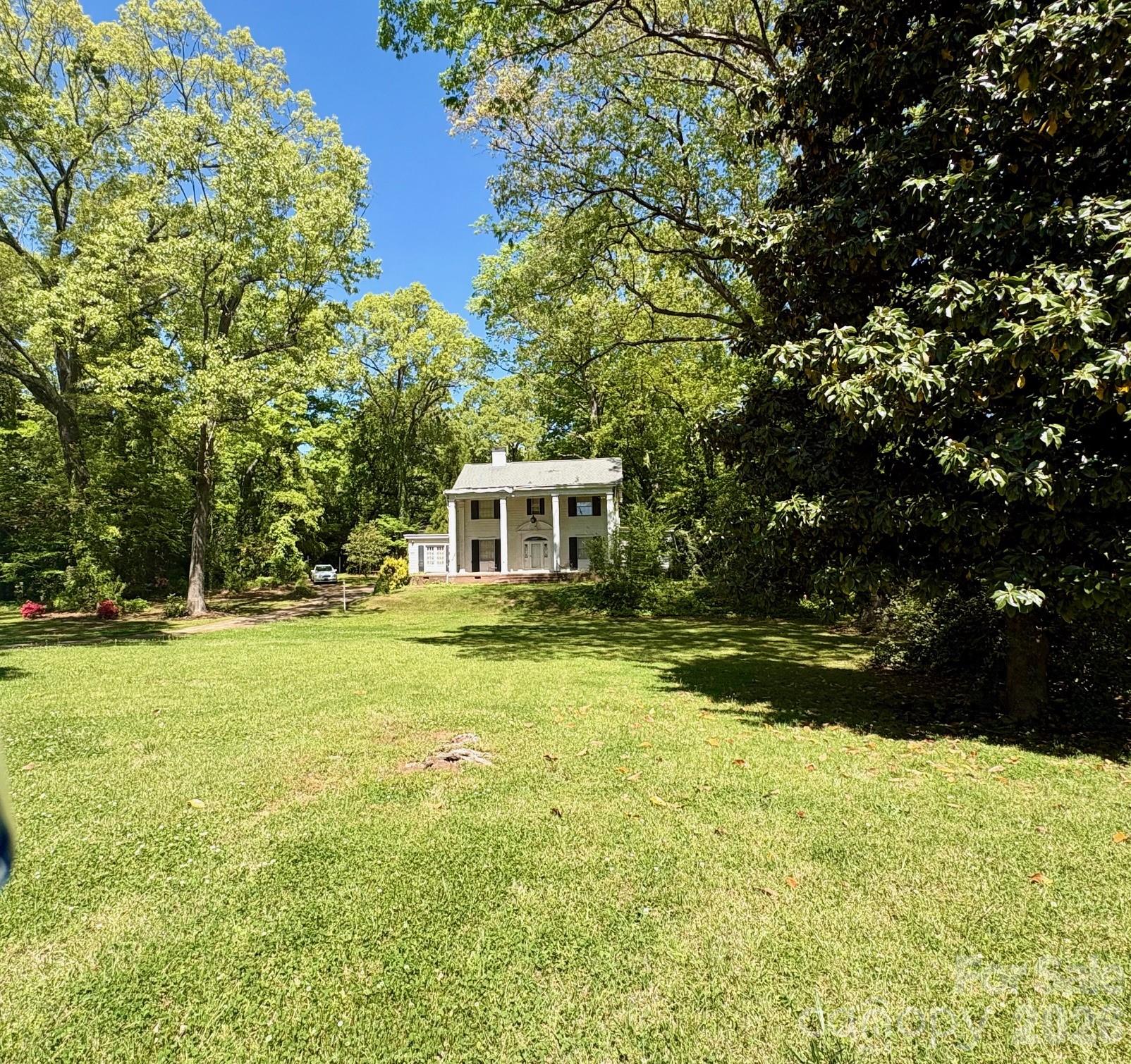 1612 South New Hope Road Gastonia, NC 28054 - Photo 5 of 38 a front view of house with yard and green space