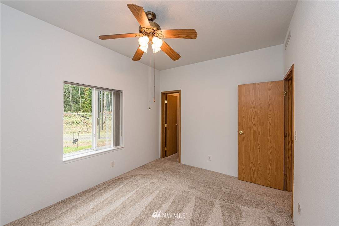 13 North Eldridge Road Sequim, WA 98382 - Photo 12 of 23 a view of an empty room with a window