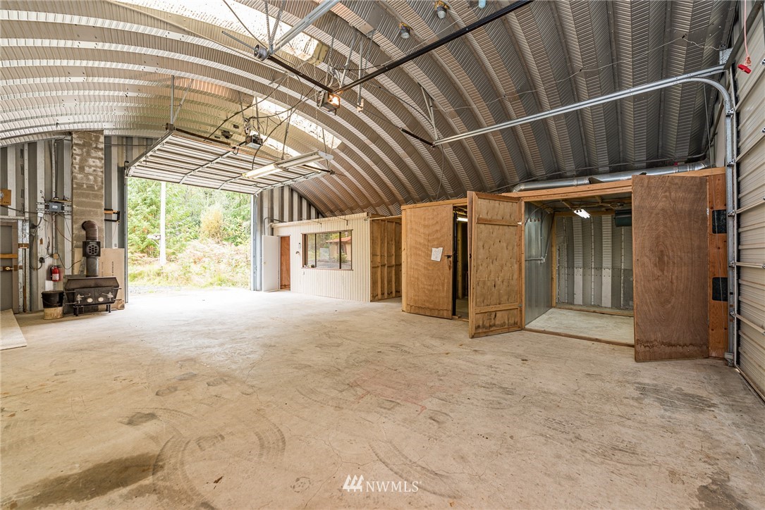 13 North Eldridge Road Sequim, WA 98382 - Photo 19 of 23 a view of an empty room with wooden floor