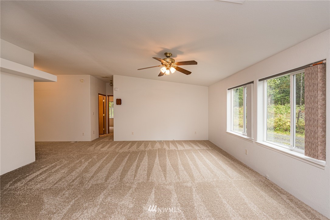 13 North Eldridge Road Sequim, WA 98382 - Photo 3 of 23 a view of an empty room with a window