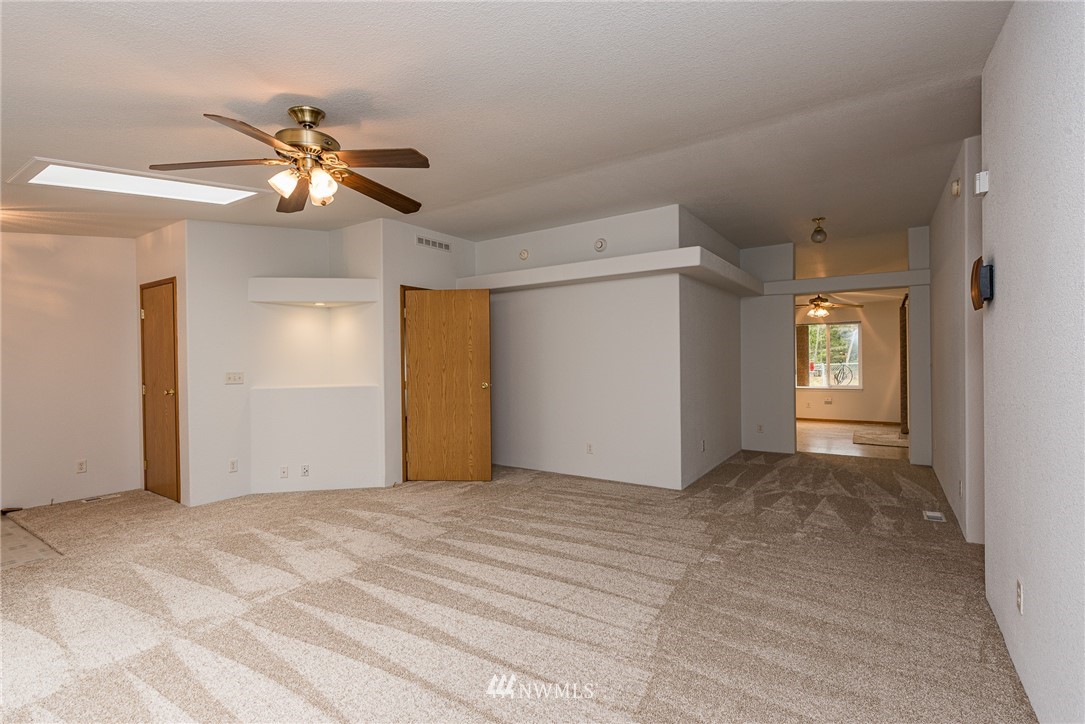 13 North Eldridge Road Sequim, WA 98382 - Photo 4 of 23 a view of a big room with closet and a ceiling fan
