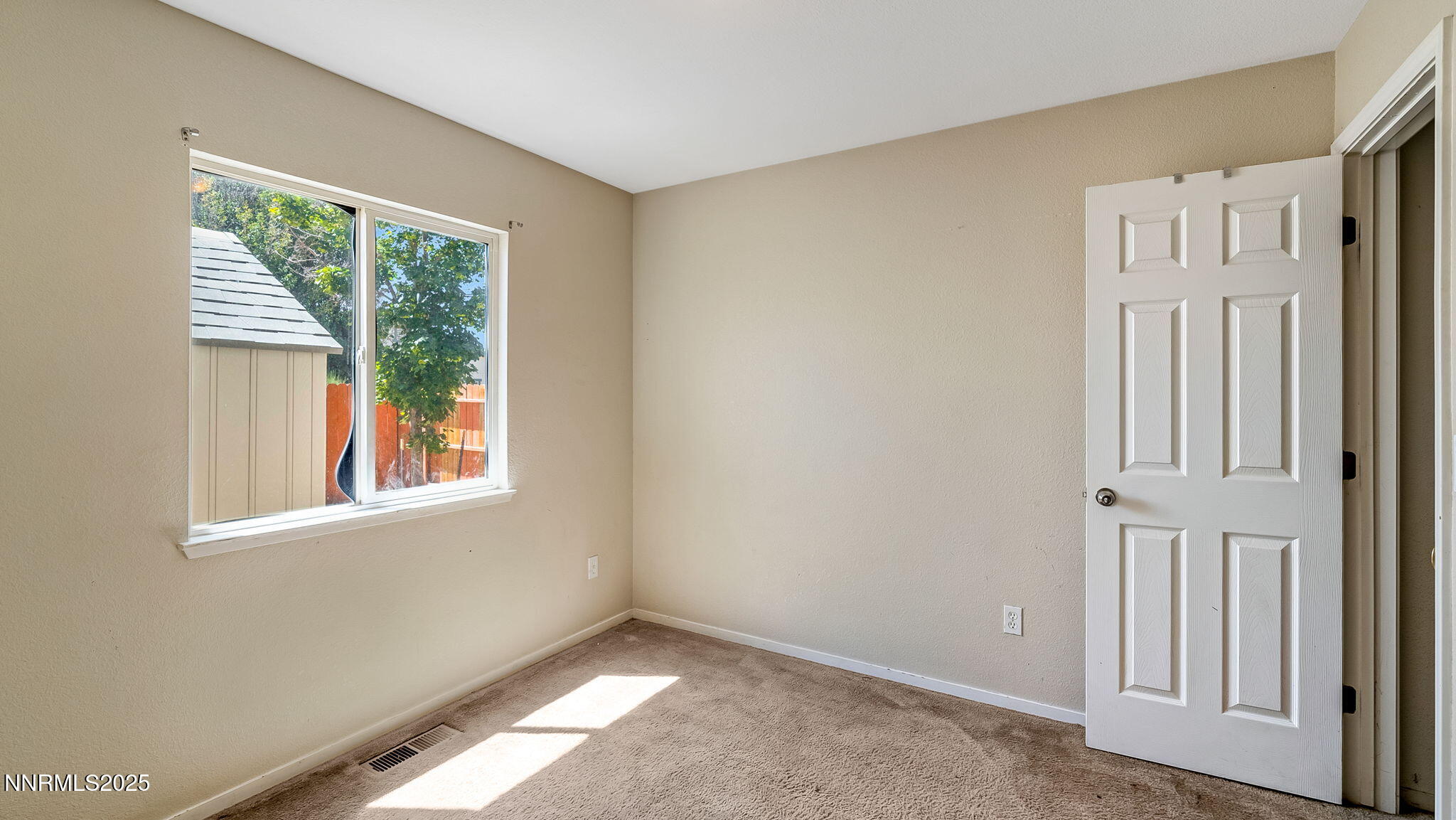 17776 Fortune Court Reno, NV 89508 - Photo 19 of 28 an empty room with windows