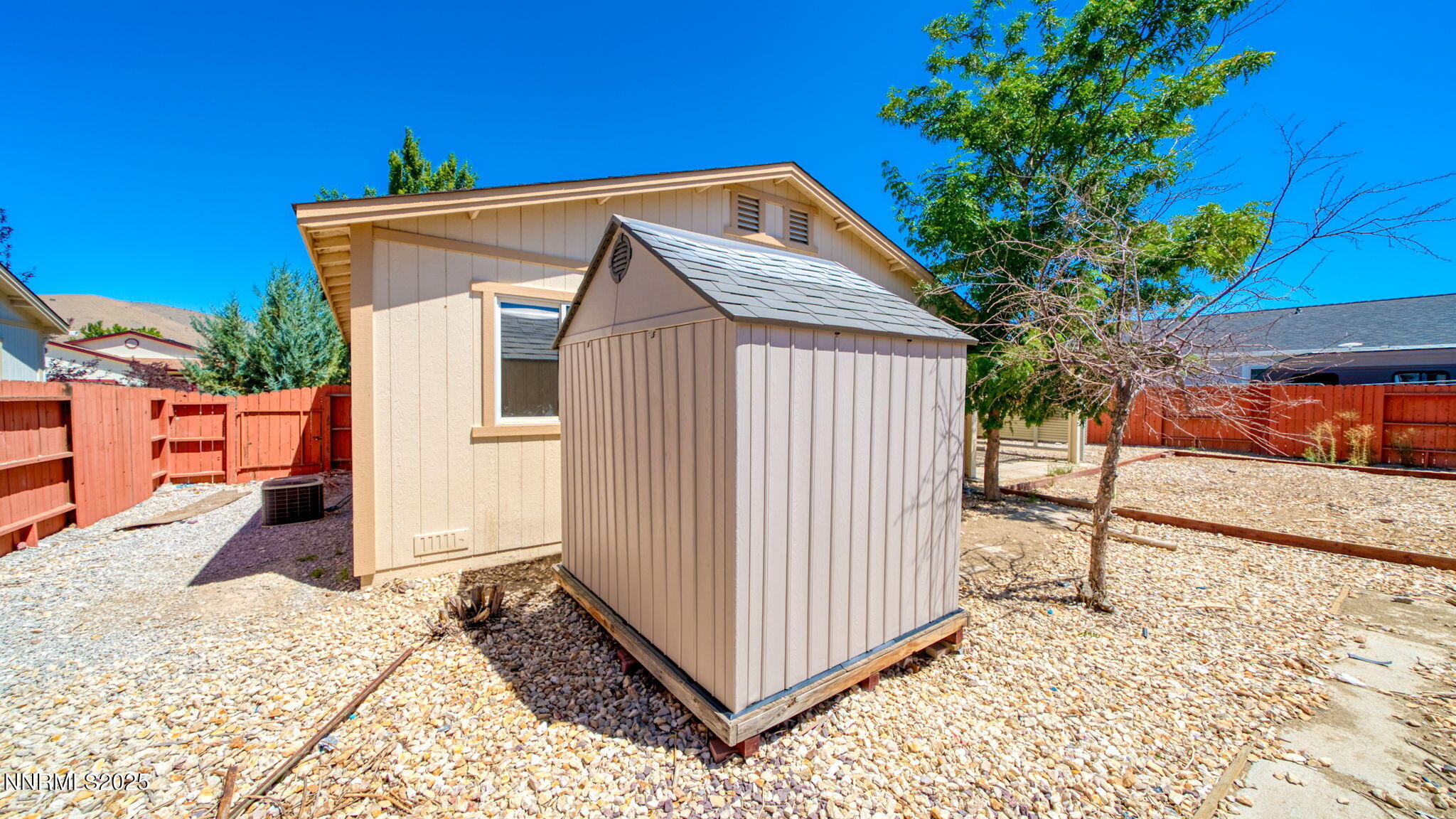 17776 Fortune Court Reno, NV 89508 - Photo 24 of 28 a front view of a house with backyard
